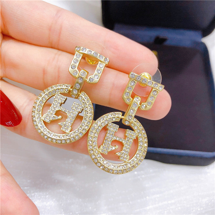 House of Hutson Original - Circle H-Letter Earrings.