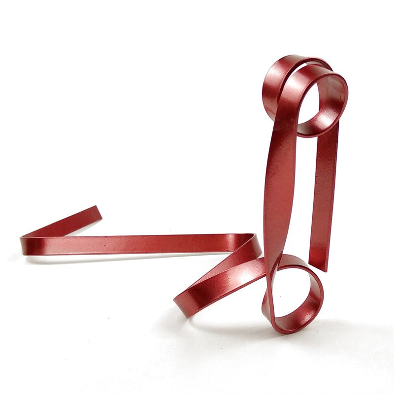 *New Christmas Decor Alert* - Metal ribbon suspended wine holder for holdiay decor and party