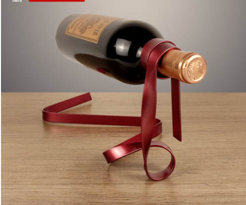 *New Christmas Decor Alert* - Metal ribbon suspended wine holder for holdiay decor and party