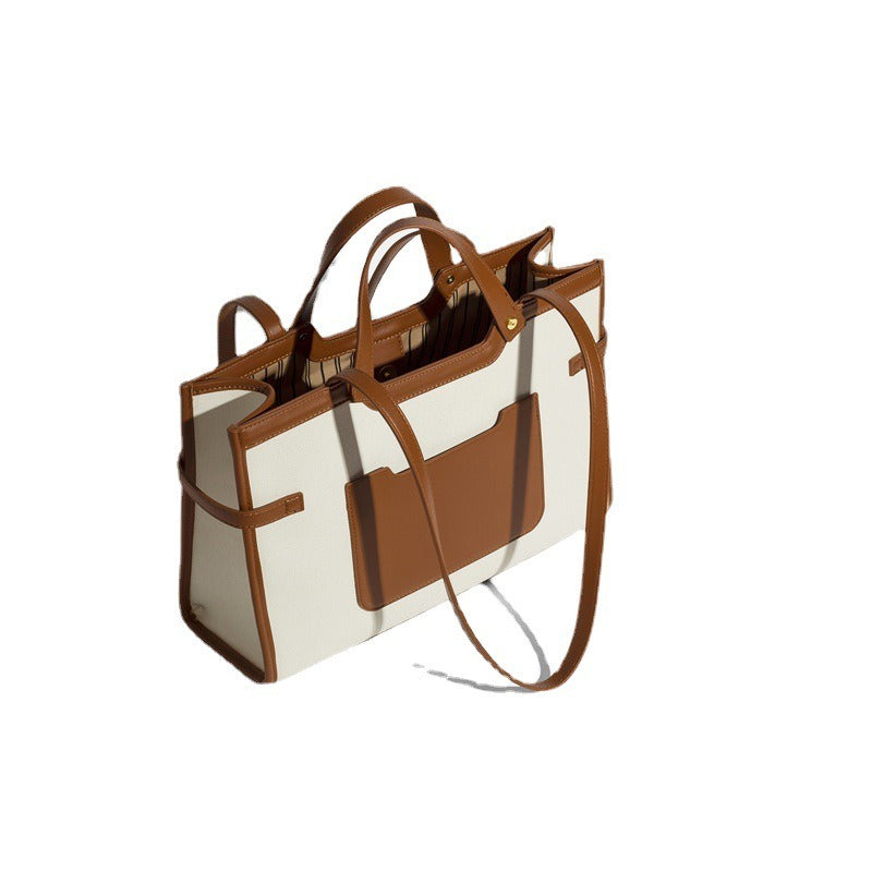 Canvas tote bag, high-end niche design, single shoulder commuter handbag, simple and large capacity. Trendy.